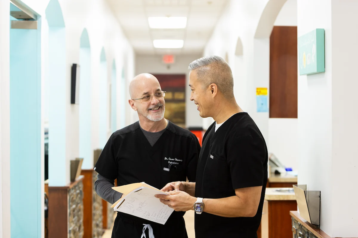 Two dentists taking